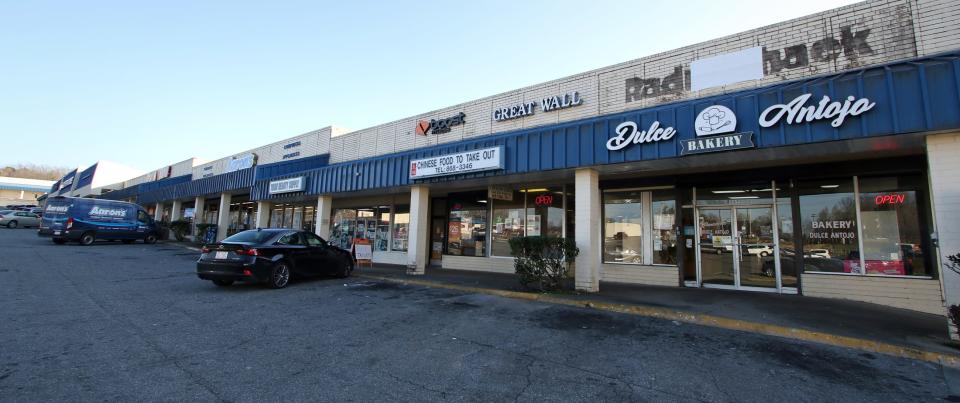 Some of several stores at the Dixie Village Shopping Center on West Franklin Boulevard. The strip mall has a new owner and a promise for improvements.