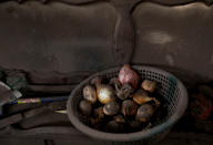 <p>Onions are seen at a house affected by the eruption of the Fuego volcano at San Miguel Los Lotes in Escuintla, Guatemala, June 8, 2018. (Photo: Carlos Jasso/Reuters) </p>