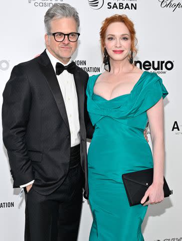 Earl Gibson III/Shutterstock George Bianchini and Christina Hendricks