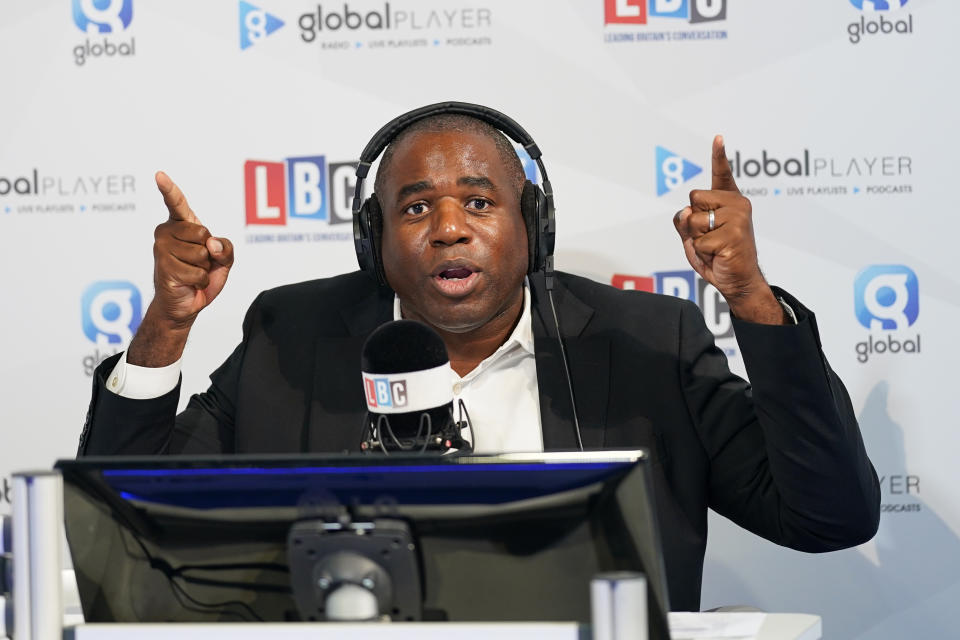 LIVERPOOL, ENGLAND - SEPTEMBER 25: David Lammy, Shadow Secretary of State for Foreign, Commonwealth and Development Affairs speaks on LBC Radio on the first day of the Labour Party Conference in Liverpool on September 25, 2022 in Liverpool, England The Labour Party hold their annual conference in Liverpool this year. Issues on the agenda are the cost of living crisis, including a call for a reinforced windfall tax, proportional representation and action on the climate crisis. (Photo by Ian Forsyth/Getty Images)