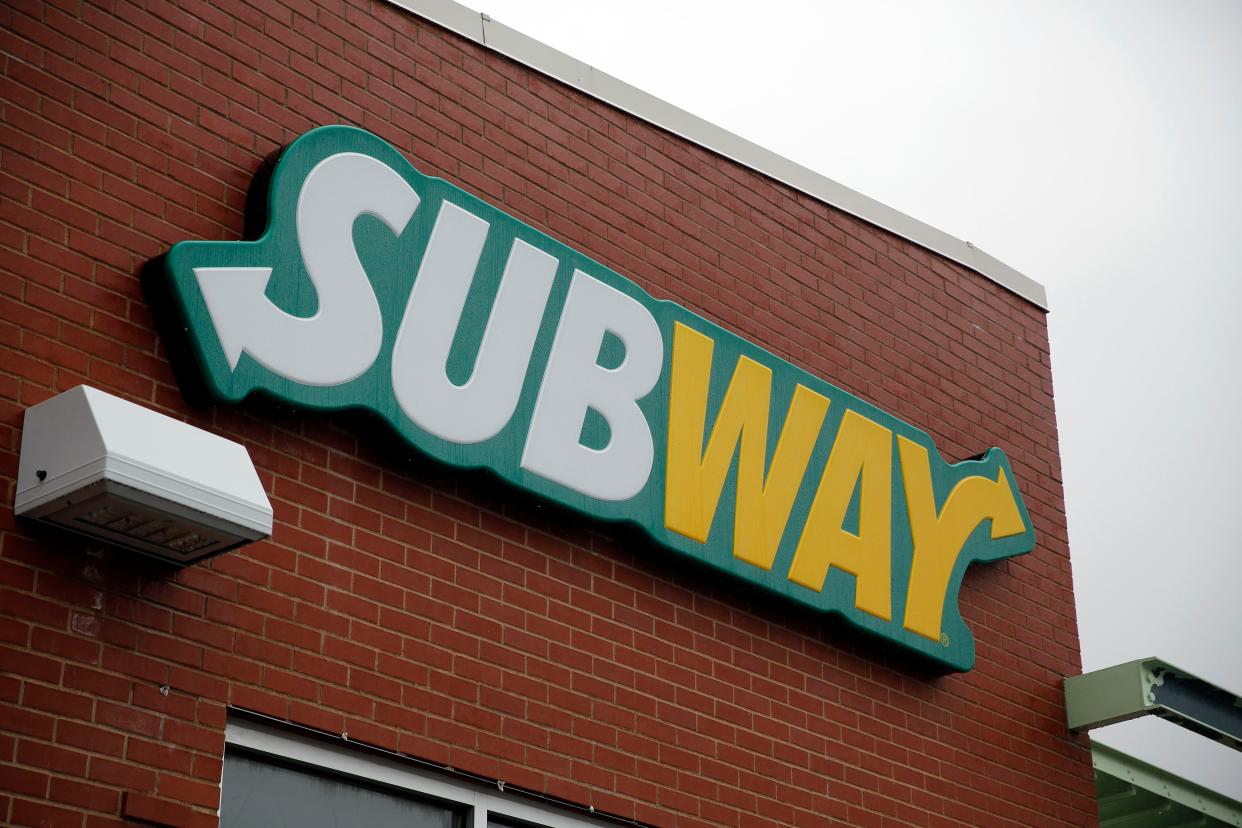 A sign hangs outside a Subway restaurant on July 7, 2015, in St. Louis. 