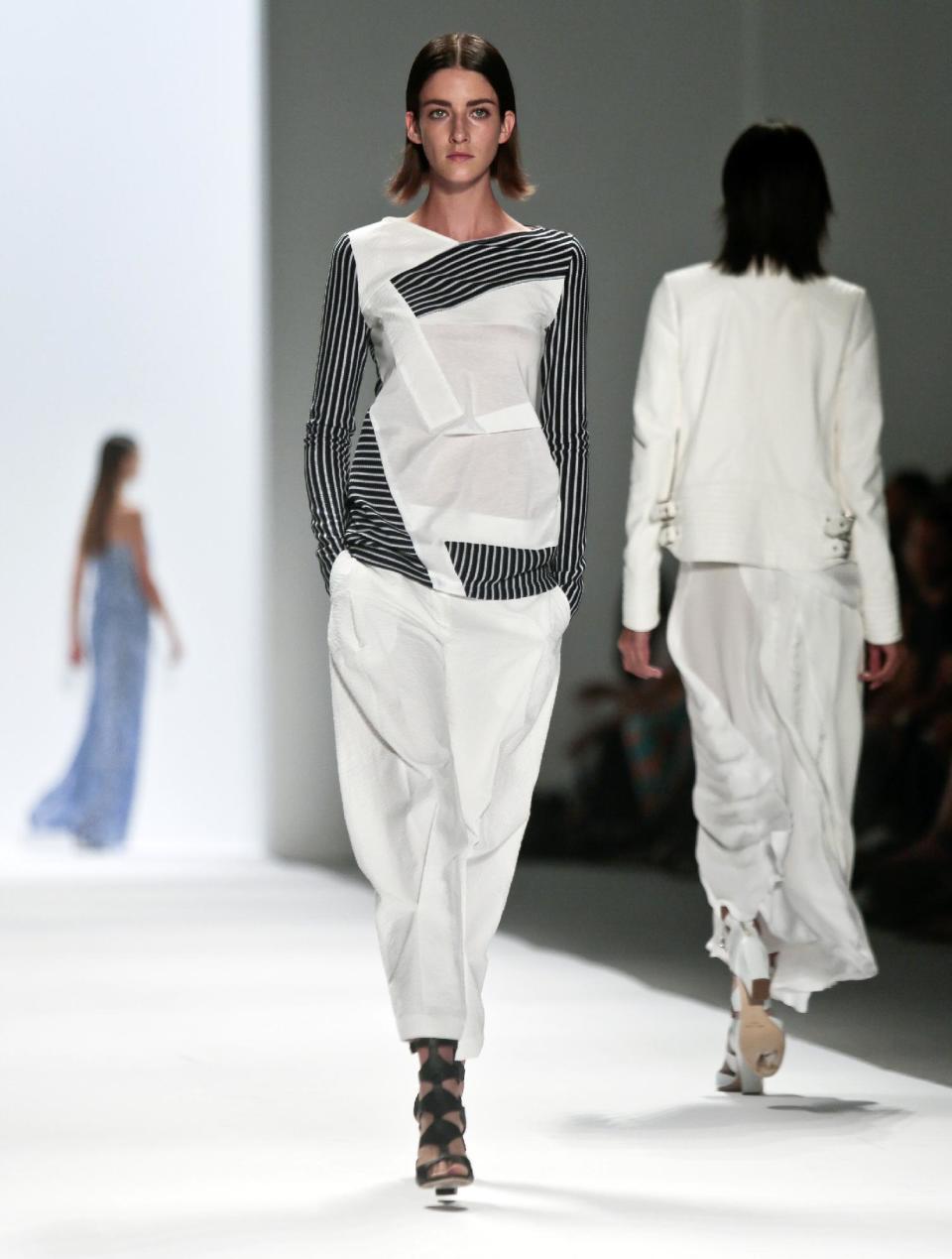 Fashion from the Richard Chai Spring Summer 2014 collection is modeled on Thursday, Sept. 5, 2013, during Fashion Week in New York. (AP Photo/Bebeto Matthews)