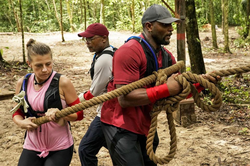 “It’s Your Super Bowl” – The seven remaining celebrities come together to celebrate Coach Mike Singletary’s birthday. Also, teams must work together to trek one mile through a rugged swamp and rappel down a six-story cliff during the “Witness the Fitness” challenge. And one celeb seeks medical attention for their swollen jaw and considers ringing the bell, on BEYOND THE EDGE, Wednesday April 20 (9:00-10:00 PM, ET/PT) on the CBS Television Network, and available to stream live and on demand on Paramount+*. Pictured: Jodie Sweetin, Mike Singletary and Metta World Peace. Photo: Robert Voets/CBS ©2021 CBS Broadcasting, Inc. All Rights Reserved.