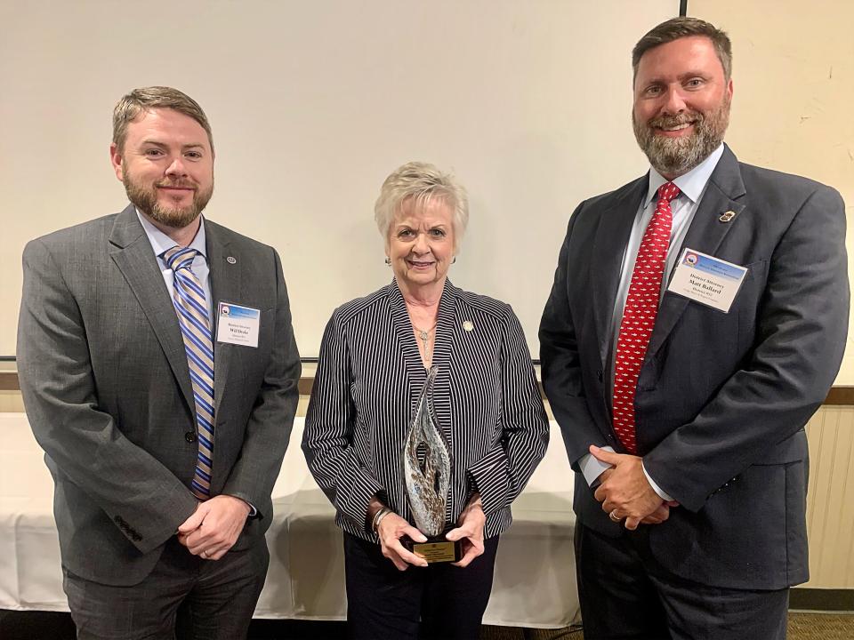 Washington and Nowata County District Attorney Will Drake, left, state Sen. Julie Daniels and Rogers County District Attorney Matt Ballard pose with Daniels' Infinity Award from the Oklahoma District Attorneys Association.