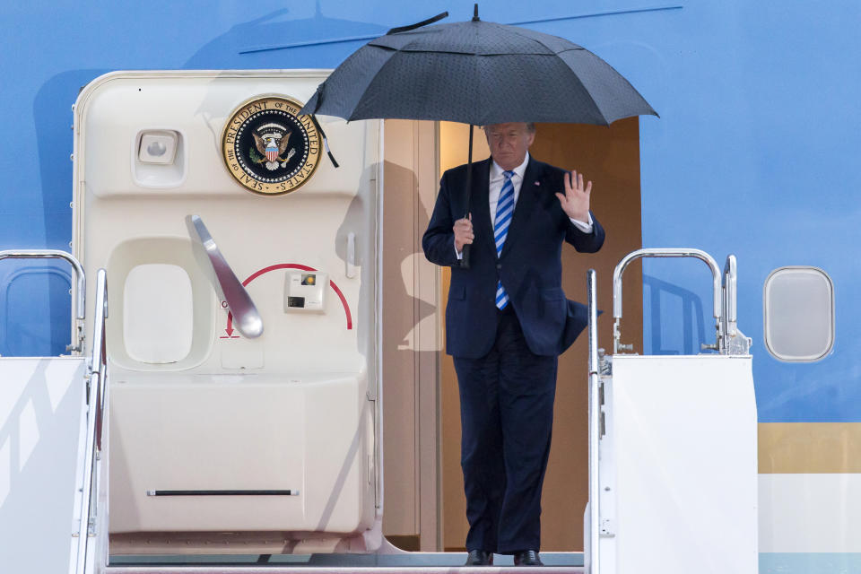 U.S. President Donald Trump waves as he arrives for the G-20 Osaka summit. (Photo: Tomohiro Ohsumi via Getty Images)