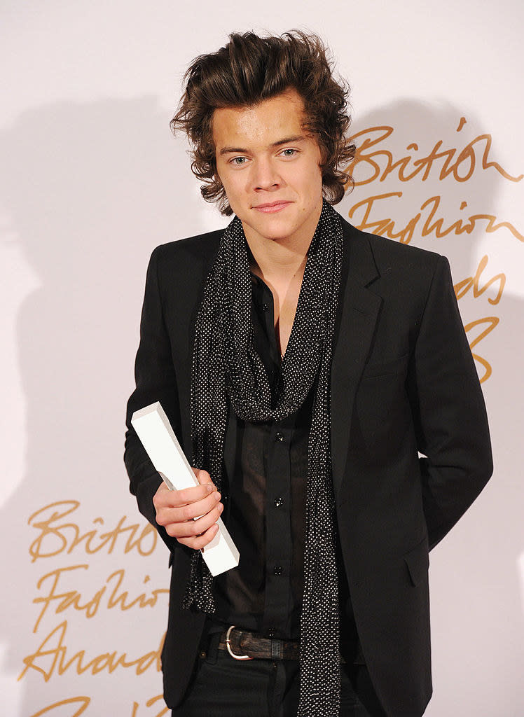 Close-up of harry in a blazer and scarf