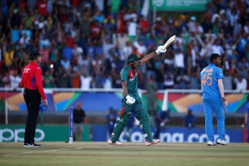 Rakibul Hasan salutes the crowd after hitting the winning runs for Bangladesh in the Under 19 World Cup final against India