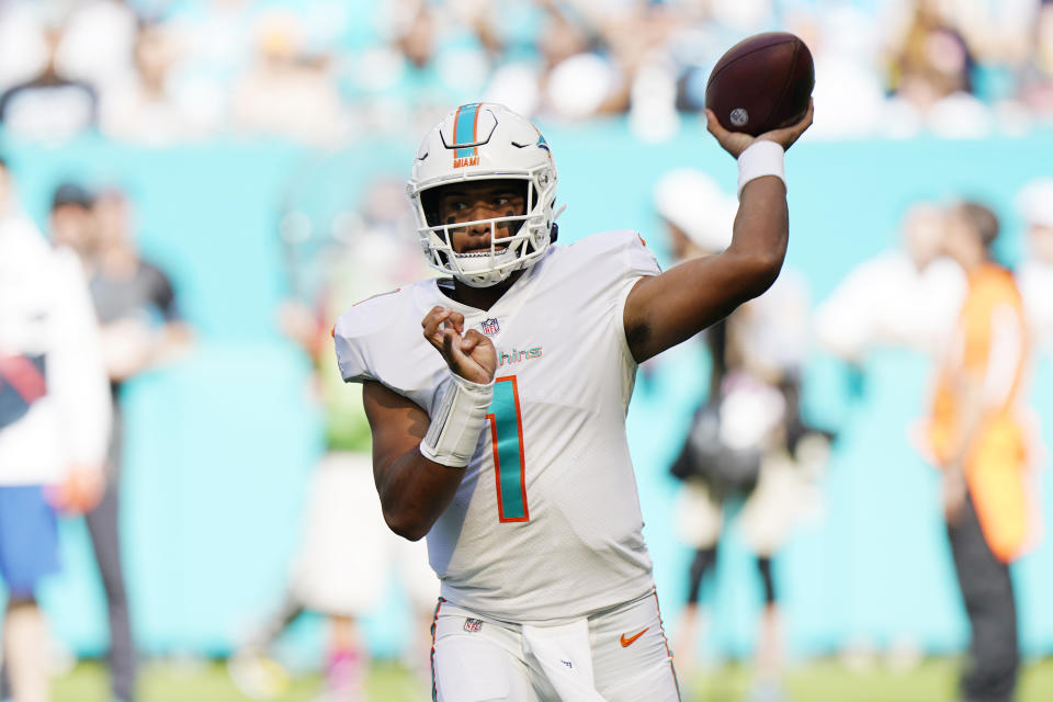 Miami Dolphins quarterback Tua Tagovailoa (1) aims a pass during the first half of an NFL football game against the Carolina Panthers, Sunday, Nov. 28, 2021, in Miami Gardens, Fla. (AP Photo/Wilfredo Lee)