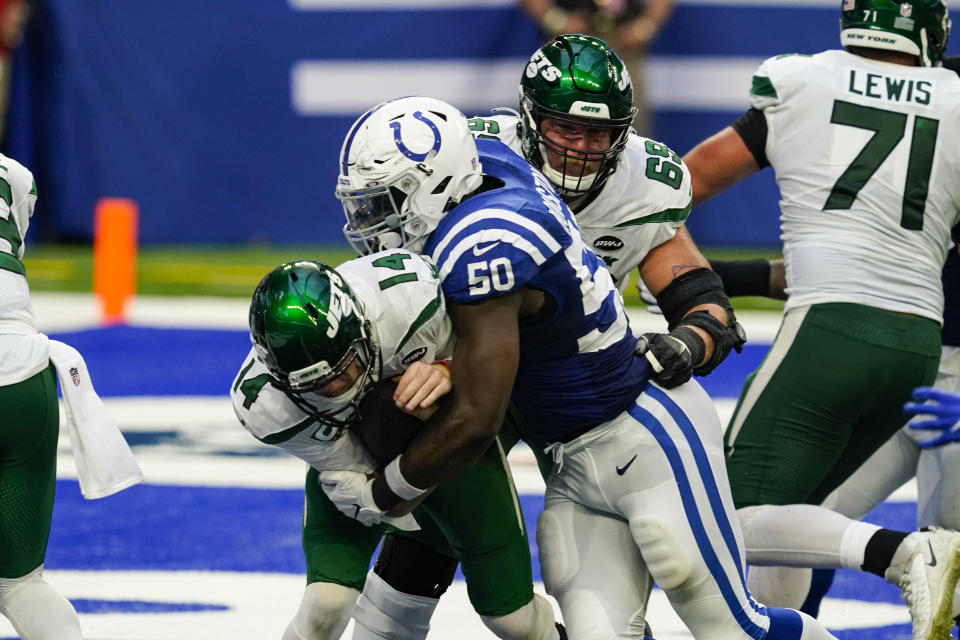 Indianapolis Colts defensive end Justin Houston (50) sacks New York Jets quarterback Sam Darnold (14) for a safety in the second half of an NFL football game in Indianapolis, Sunday, Sept. 27, 2020. (AP Photo/Darron Cummings)