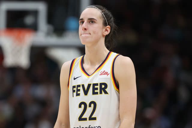 <p>Steph Chambers/Getty </p> Caitlin Clark #22 of the Indiana Fever reacts during the fourth quarter against the Seattle Storm in the game at Climate Pledge Arena on May 22, 2024 in Seattle, Washington