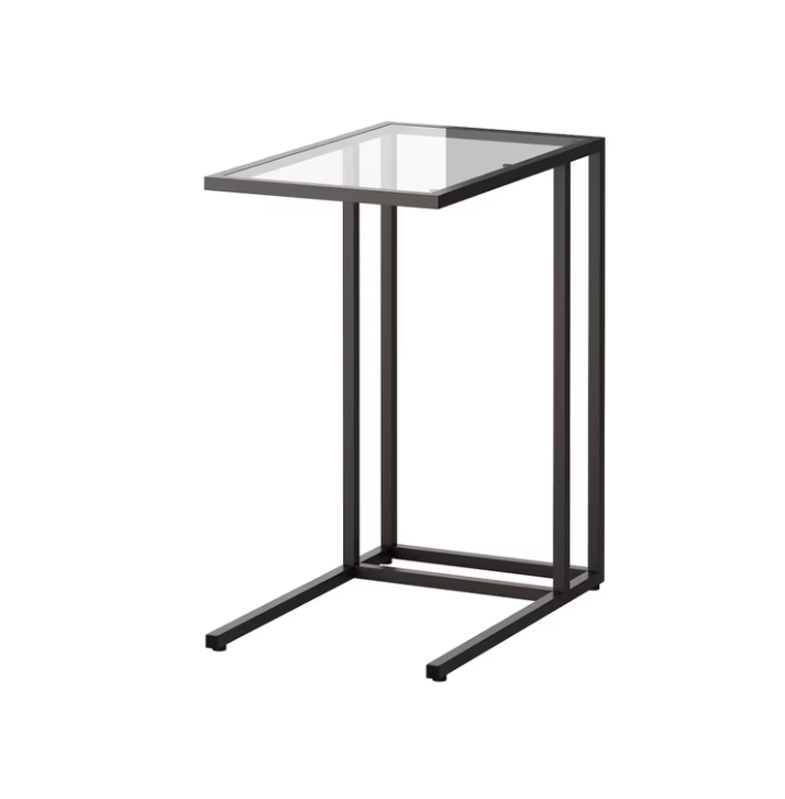 <p><a href="https://www.ikea.com/us/en/p/vittsjoe-laptop-stand-black-brown-glass-00250249/" rel="nofollow noopener" target="_blank" data-ylk="slk:Shop Now;elm:context_link;itc:0;sec:content-canvas" class="link ">Shop Now</a></p><p>VITTSJÖ Laptop Stand</p><p>$44.99</p>