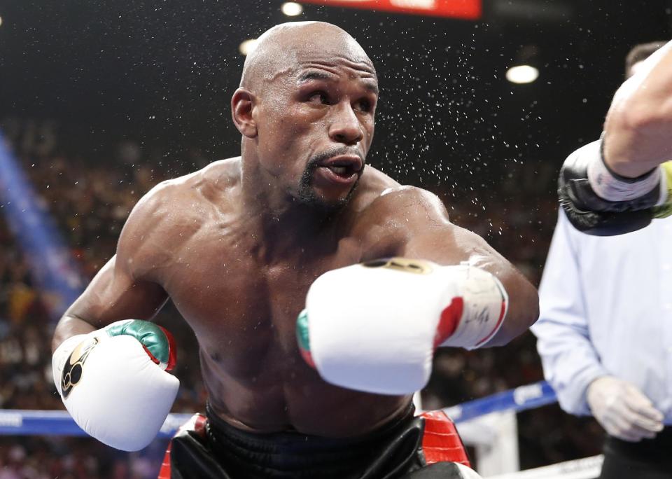 Floyd Mayweather Jr. is seen in his WBC-WBA welterweight title boxing fight against Marcos Maidana Saturday, May 3, 2014, in Las Vegas. (AP Photo/Eric Jamison)