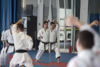 Spanish karate athlete Damian Quinteros is reflected in a large mirror as he trains in Madrid, Spain, Friday, Feb. 7, 2020. More than five years ago, one of Spain's most successful karate athletes was splitting his time between practice, school and his day job as an aeronautical engineer. Now, nearly five months before the Tokyo Games, Quintero is a full-time karateka and a top contender for the gold medal in Japan. (AP Photo/Paul White)