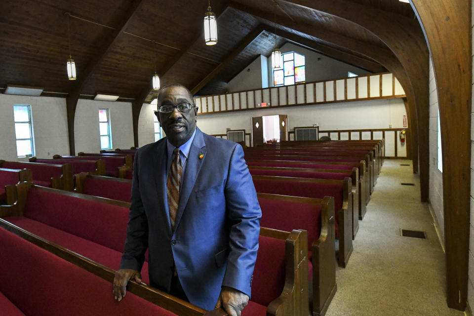 In this Feb. 16, 2020, photo, Perry County Commissioner Albert Turner Jr. poses for a photograph in the pews of the Marion Baptist Academy before Jimmie Lee Jackson day in Marion, Ala. What happened in Marion is now a little-remembered episode in the civil rights movement, a footnote in the textbooks. "Starting the story in Selma is like reading a book by starting in the middle and not going back to the beginning so you can get the total picture of what actually happened in 1965," Turner Jr. said.(AP Photo/Julie Bennett)