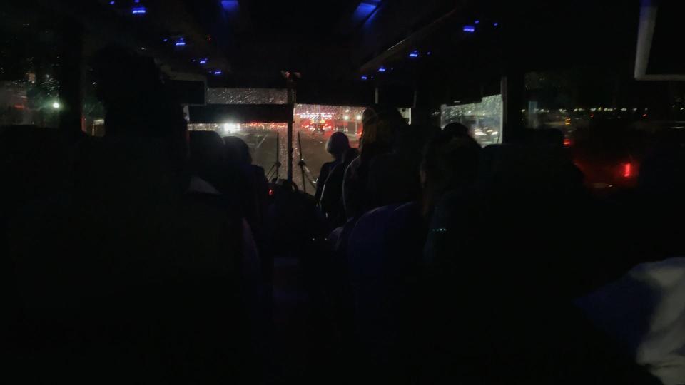 15 women from Texas take a bus home late at night after flying to Albuquerque, New Mexico for legal abortions.