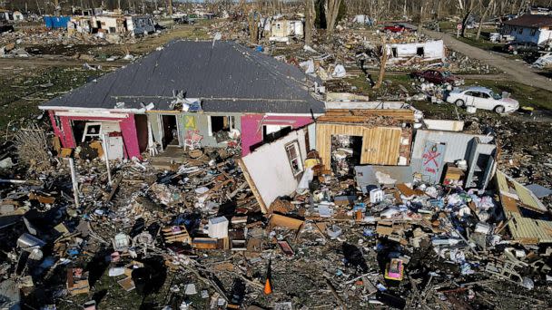 PHOTO: Two severely damaged homes are seen in a neighborhood in the aftermath of a tornado in Sullivan, Indiana, April 2, 2023. (Jon Cherry/Reuters)