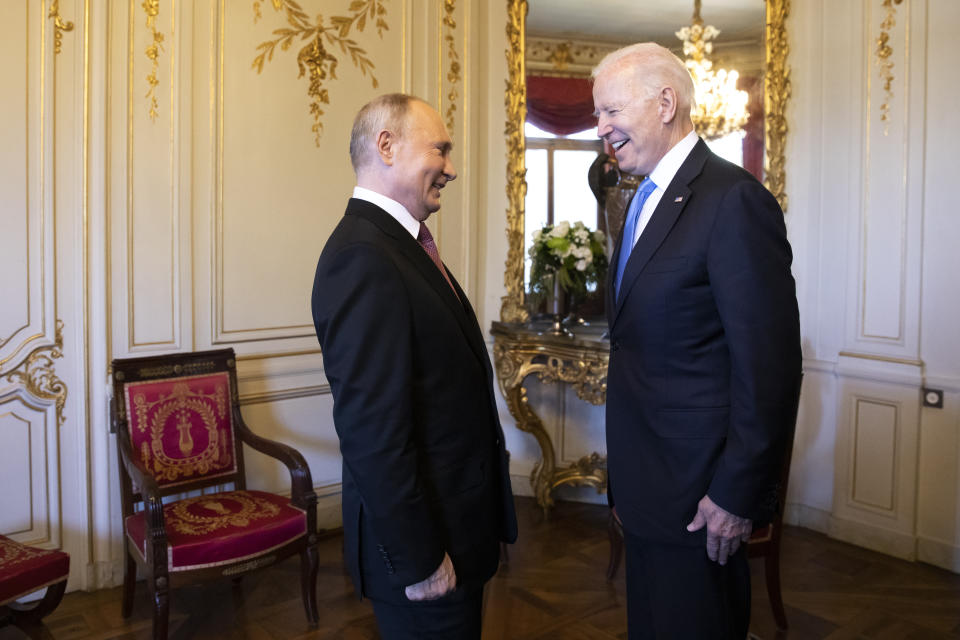 Russian president Vladimir Putin, left, talks with U.S. President Joe Biden, right, during the U.S. - Russia summit in Geneva, Switzerland, Wednesday, June 16, 2021. (Peter Klaunzer/Swiss Federal Office of Foreign Affairs via AP)