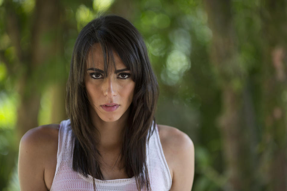 In this Dec. 4, 2012 photo, Brazilian transgender model Felipa Tavares poses for portraits during a photo session in Rio de Janeiro, Brazil. The 6-foot-tall Tavares is among Brazil's small but growing ranks of transgender models _ leggy, high-cheekboned sirens who were born men and are causing a splash here as well as in Paris and other international fashion capitals. (AP Photo/Felipe Dana)