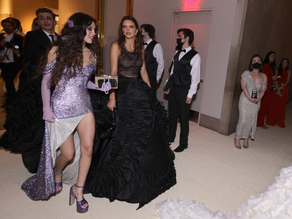 Olivia Rodrigo and Kendall Jenner walk around the Met Gala on May 2, 2022.