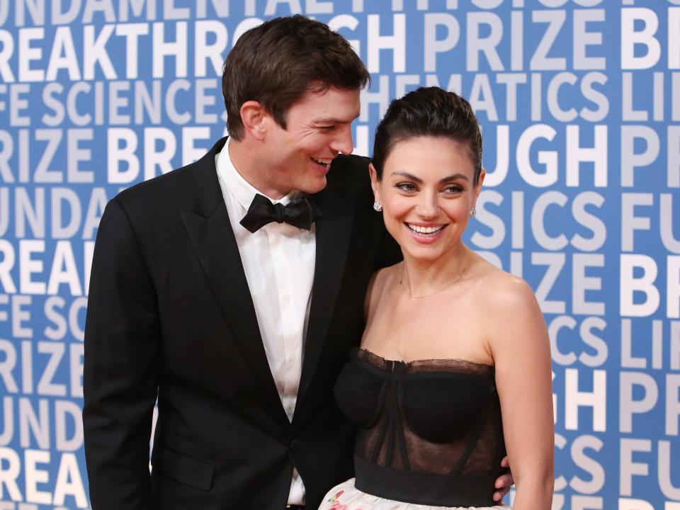 Actors Ashton Kutcher (L) and Mila Kunis attend the 2018 Breakthrough Prize at NASA Ames Research Center on December 3, 2017 in Mountain View, California.