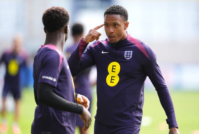 England’s Ezri Konsa (right) speaks to team-mate Bukayo Saka during a training session at the Ernst-Abbe-Sportfeld in Jena