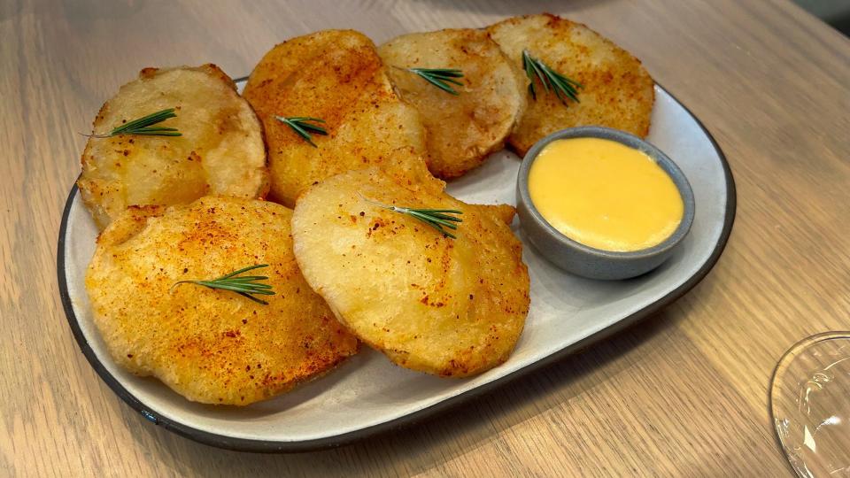 The Potato Fritto at Mad Nice in Midtown Detroit is filled with yukon potatoes and served with spicy hollandaise.