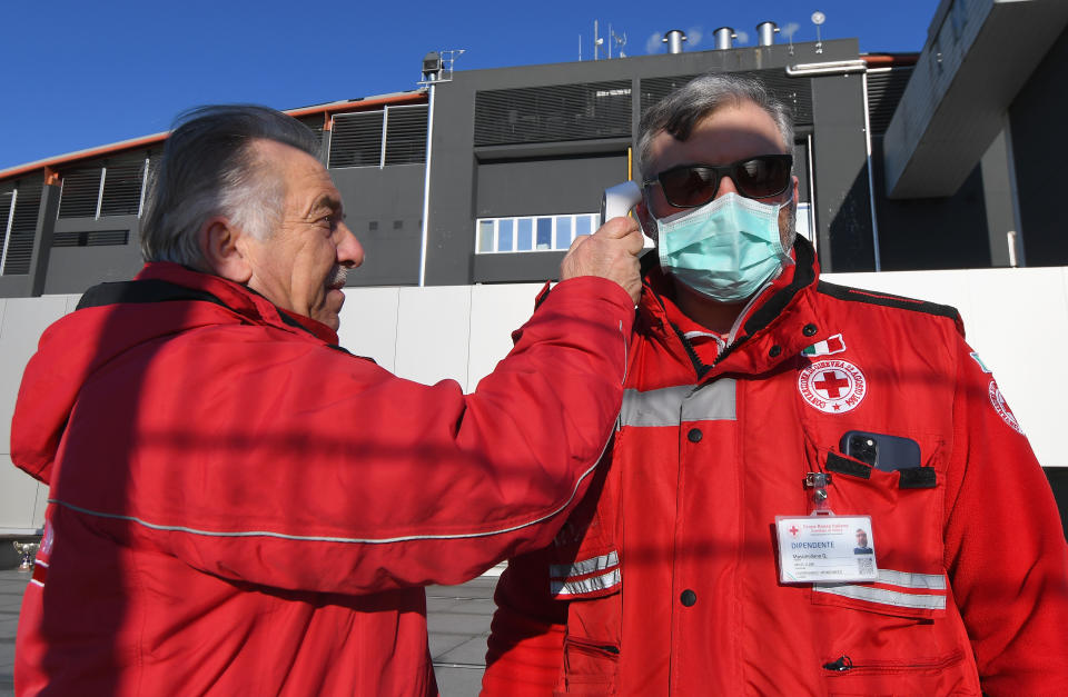 An operator performs anti-coronavirus checks before the Serie A match between Udinese Calcio and ACF Fiorentina at Stadio Friuli on March 08, 2020 in Udine, Italy. (Photo by Alessandro Sabattini/Getty Images)