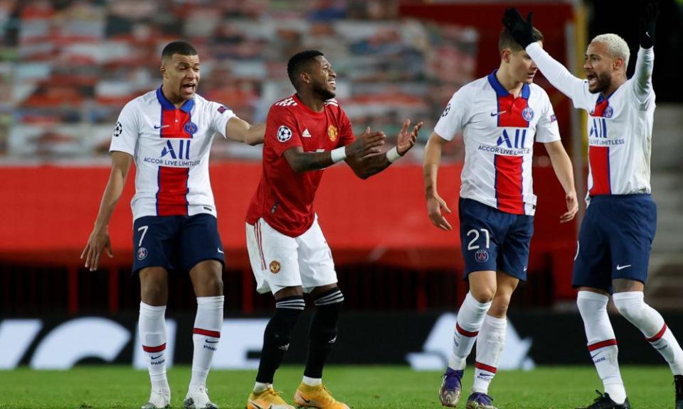 Manchester United’s Fred (centre) reacts after he is sent off in the second half.