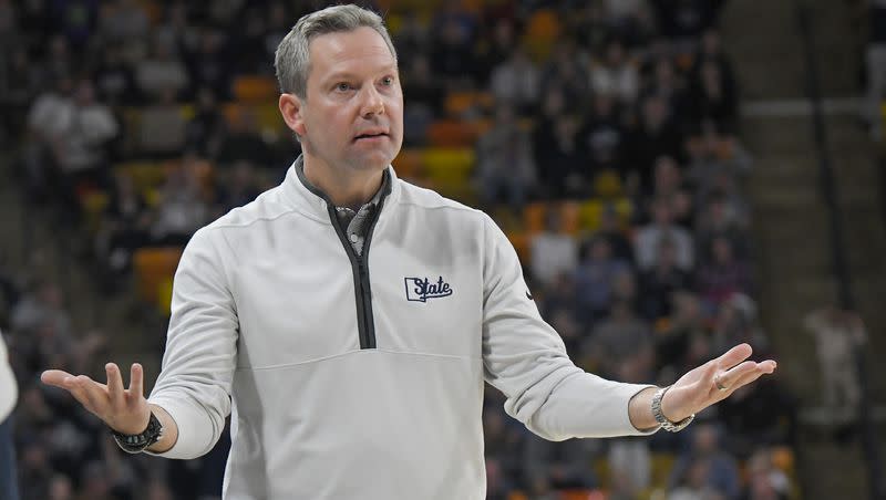 Utah State head coach Ryan Odom questions a call during the first half of an NCAA college basketball game against San Diego State on Wednesday, Feb. 8, 2023, in Logan. Odom is reportedly poised to be the new head coach at VCU.