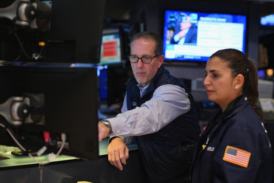 FTSE Traders work on the floor of the New York Stock Exchange during morning trading on May 17, 2024 in New York City. Wall Street stocks opened little changed May 17 after pulling back from a record run where the Dow exceeded 40,000 points for the first time. Around 10 minutes into trading the Dow Jones Industrial Average was steady at 39,872.66. (Photo by ANGELA WEISS / AFP) (Photo by ANGELA WEISS/AFP via Getty Images)