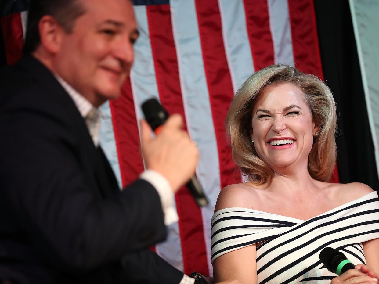 <p>Senator Ted Cruz (R-TX) speaks as his wife Heidi Cruz (R) looks on during a Women for Cruz rally on 3 November 2018 in Houston, Texas</p> ((Getty Images))