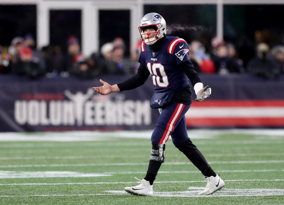 New England Patriots quarterback Mac Jones was fined in two separate incidents during last week's loss to the Cincinnati Bengals. (Photo by John Trumacchi/The Boston Globe for Getty Images)