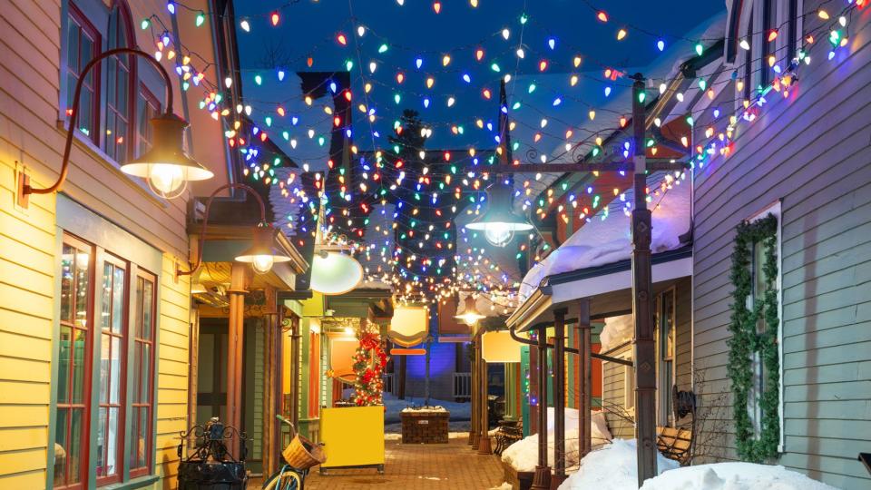 Downtown streets at night in the winter with holiday lighting in Breckenridge, CO