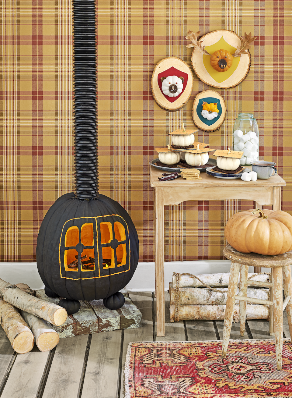 <p>Warm up your front porch with this adorable wood-burning stove idea. It's pretty easy to create, and <a href="https://www.countryliving.com/diy-crafts/how-to/a3048/halloween-templates-1009/" rel="nofollow noopener" target="_blank" data-ylk="slk:Country Living even has a stencil for you to use;elm:context_link;itc:0;sec:content-canvas" class="link "><em>Country Living</em> even has a stencil for you to use</a>! </p>