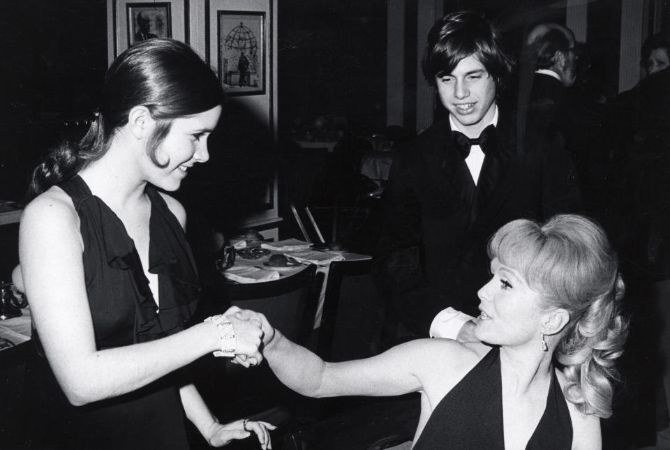 Carrie Fisher, Todd Fisher and Debbie Reynolds at the opening of "Irene" on March 13,1973, at Minskoff Theater in New York City.