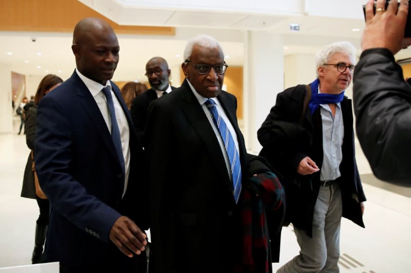 Former President of International Association of Athletics Federations (IAAF) Lamine Diack arrives for his trial at the Paris courthouse