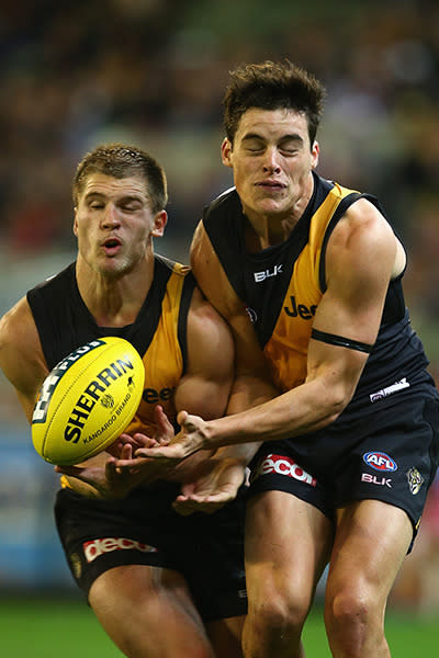 Story of the night as Richmond's Matt Arnott and Nathan Gordon get in each other's way against Collingwood