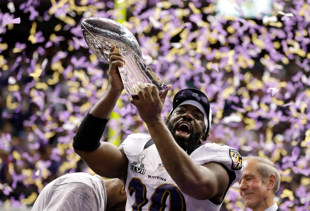 Ed Reed #20 of the Baltimore Ravens celebrates with the VInce Lombardi trophy after the Ravens won 34-31 against the San Francisco 49ers during Super Bowl XLVII at the Mercedes-Benz Superdome on February 3, 2013