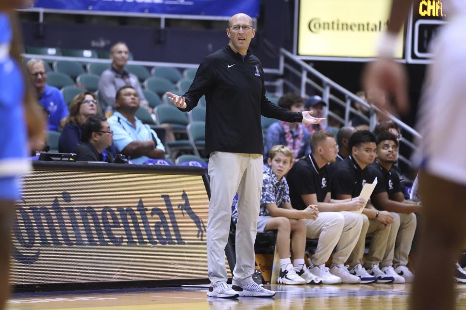 Chaminade coach Eric Bovaird reacts to play as the team takes on UCLA during the second half of an NCAA college basketball game Tuesday, Nov. 21, 2023, in Honolulu. (AP Photo/Marco Garcia)