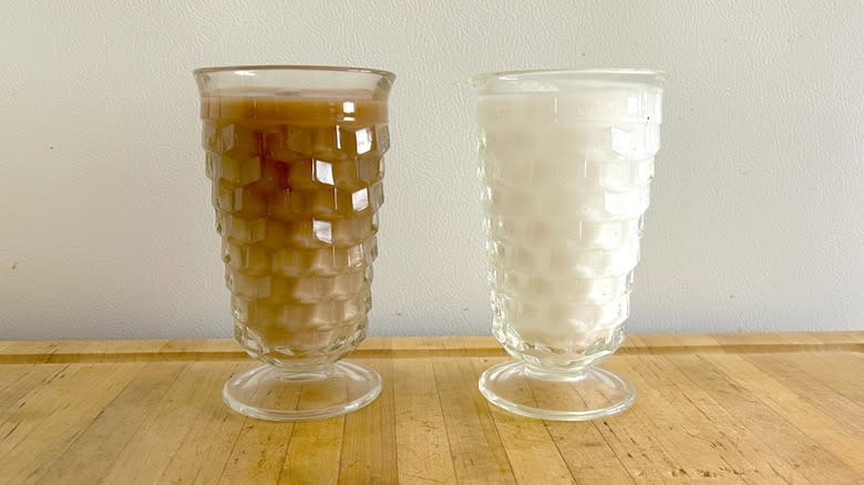 Two dirty soda glasses