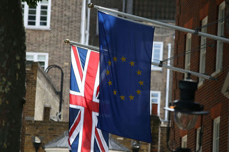 EU and British flags fly outside the European Commission building in London, Britain August 12, 2017. REUTERS/Neil Hall