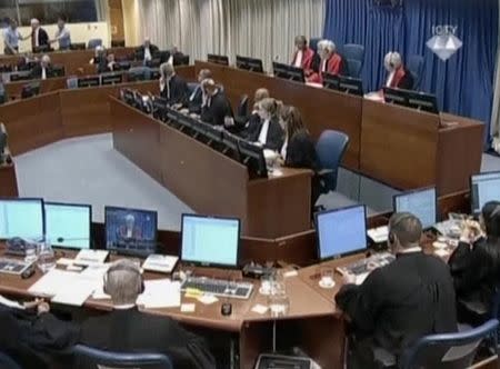 Ex-Bosnian Serb wartime general Ratko Mladic reacts in court at the International Criminal Tribunal for the former Yugoslavia (ICTY) in the Hague, Netherlands in this still image taken from a video released by the International Criminal Tribunal for the former Yugoslavia (ICTY), November 22, 2017. International Criminal Tribunal for the former Yugoslavia (ICTY)/Handout via REUTERS