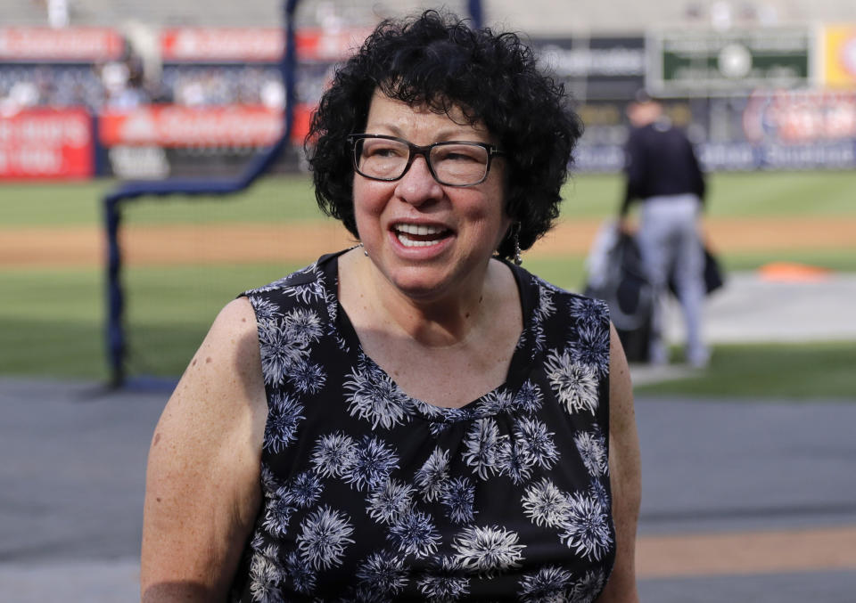 Supreme Court Associate Justice Sonia Sotomayor smiles during batting practice before a baseball game between the New York Yankees and the Boston Red Sox Friday, Aug. 2, 2019, in New York. (AP Photo/Frank Franklin II)