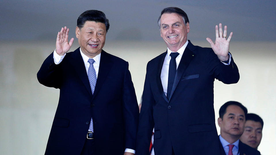 Brazil's president Jair Bolsonaro (right) seemingly took aim at China, questioning the origins of Covid-19. Source: AP