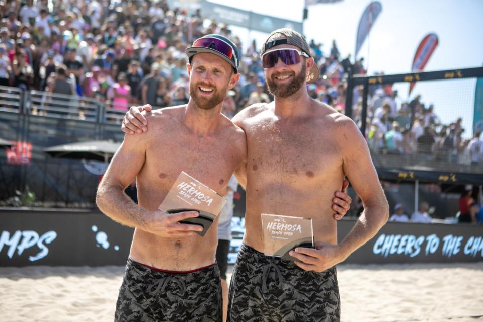 Chaim Schalk and Theo Brunner celebrate winning the the AVP Hermosa Beach Open.
