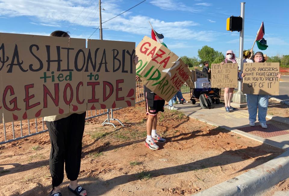 Indigenous Liberation Collective members stand at the Eastern Avenue entrance to the First Americans Museum to protest Oklahoma Israel Exchange's "Fashionably Tied" event at the museum in Oklahoma City.