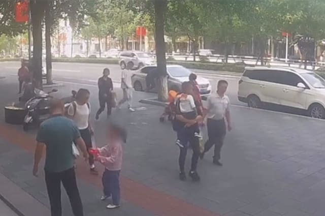 Six-year-old knocked out after glass window falls from building's 11th floor in China