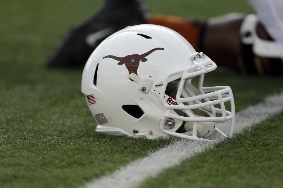 A Texas football helmet is seen during the team's spring football game, Saturday, March 30, 2013, in Austin, Texas. (AP Photo/Eric Gay)
