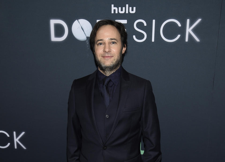 FILE - Writer-director and executive producer Danny Strong attends the premiere of the Hulu Original Series "Dopesick" on Oct 4, 2021, in New York. Hulu's eight-part miniseries about America’s opioid crisis weaves together the narcotic painkiller’s devastating toll and the actions of those who allowed or failed to prevent it. Three episodes debut Wednesday on the streaming service, with the rest out weekly. (Photo by Evan Agostini/Invision/AP, File)