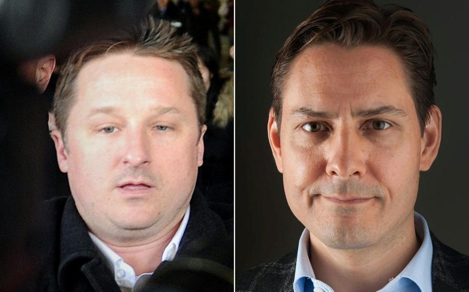 Canadian businessman Michael Spavor (left) and former Canadian diplomat Michael Kovrig - AFP